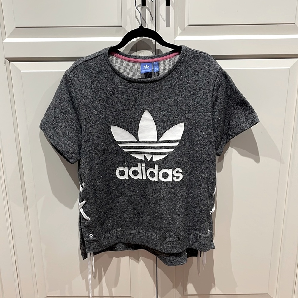 Adidas top with lace-up sides. Never worn